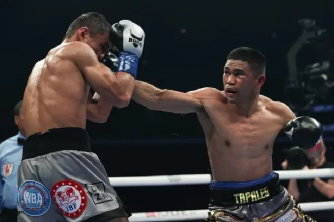 Murojon Akhmadaliev loses his IBF and WBA titles to Marlon Tapales